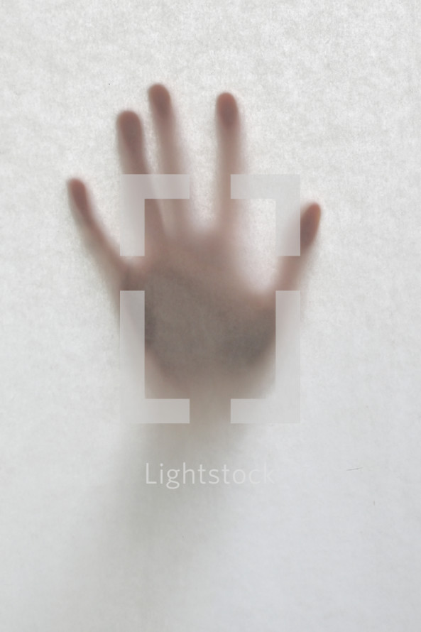 Hand Against A Blurry, Matte Glass