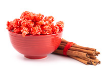 Red Cinnamon Popcorn on a White Background