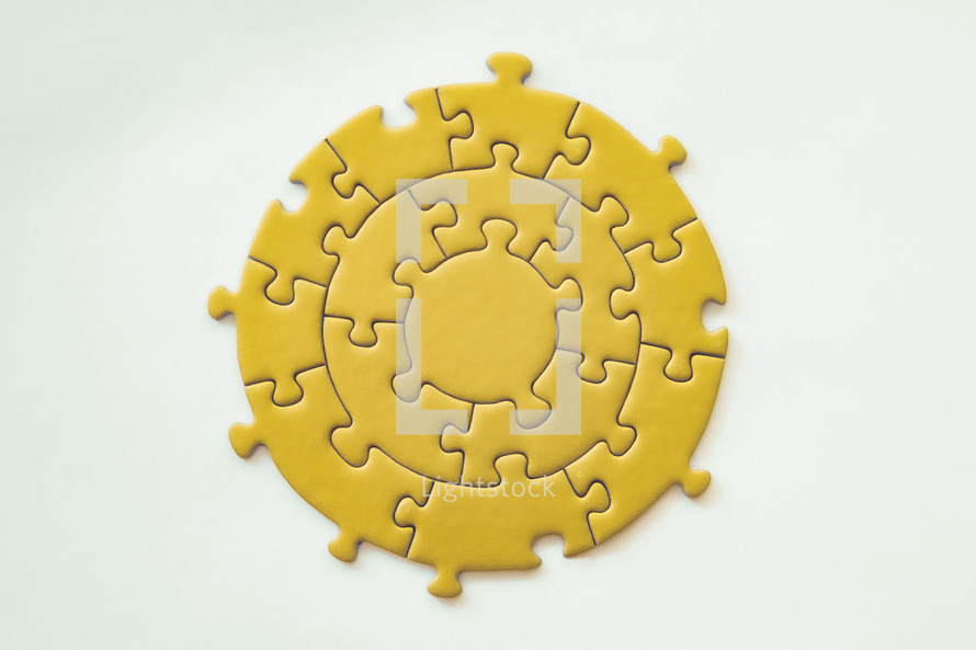 yellow puzzle on a background 