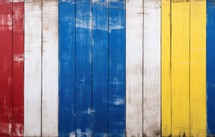 Old wooden wall painted in the different colors