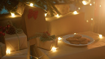 Cookies and gift under christmas tree