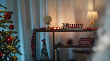 Christmas home decorations with blurred Santa Claus