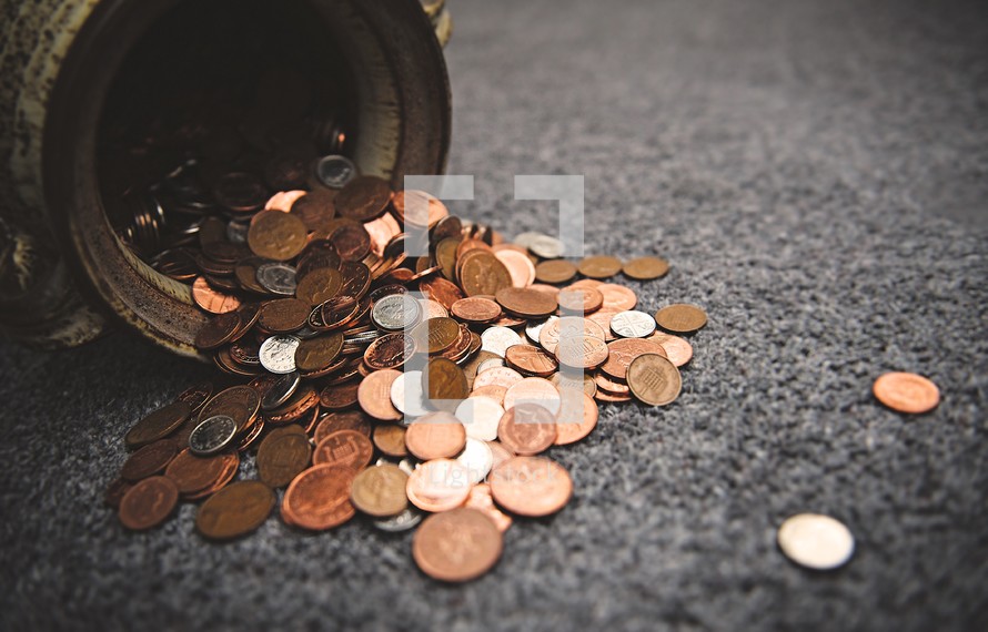 spilled pot of coins 
