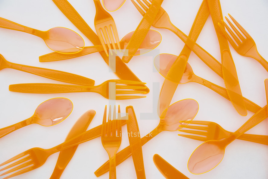 orange plastic cutlery 
