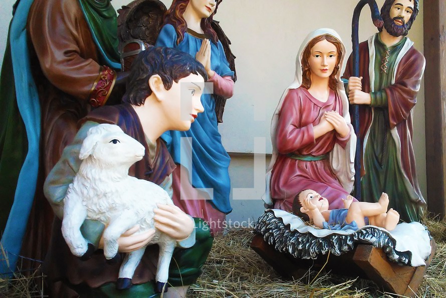 An up-close view of a local Nativity scene during Christmas showing the baby Jesus surrounded by Mary and Joseph, some shepherds and wise men adoring Jesus at His birth. What a beautiful time of year to celebrate the King of Kings. 