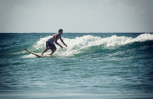 man surfing waves 