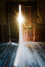 bright sunlight through an open door 