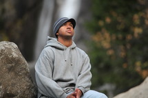 Man sitting on a rock