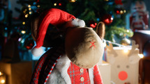 Happy reindeer puppet moving and walking under the tree 