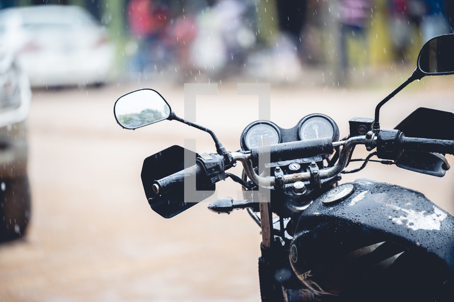 rain falling on a motorcycle in Honduras 