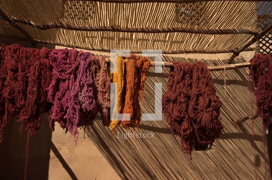 dyed yarn in a market during biblical times 