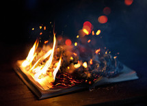 a burning Bible 