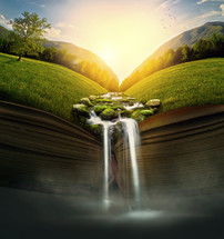 a stream running over the pages of a Bible 