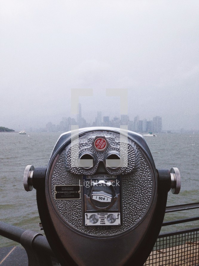 viewfinder across a bay facing towards a city 