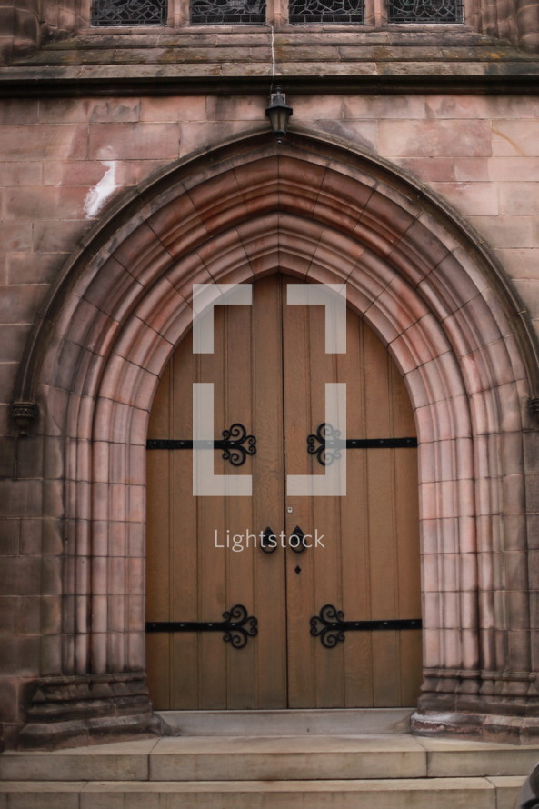 arched doors to a church 