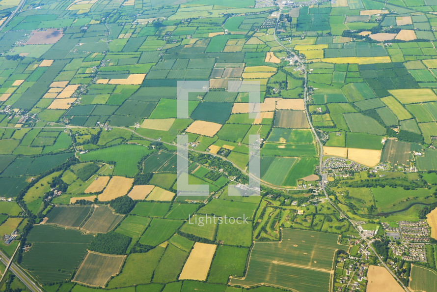 Aerial view of green pattern fields above germany