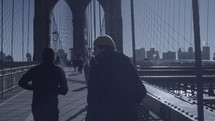 jogging on the Brooklyn Bridge 