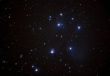 The iconic Pleiades star cluster in the night sky