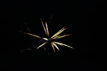 fireworks bursting in a night sky 
