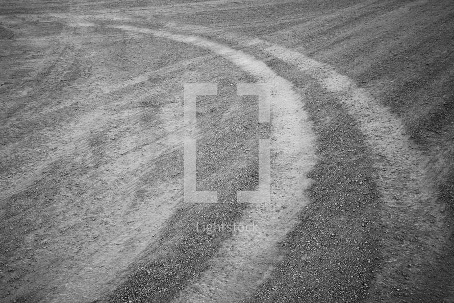 tracks in desert sand 