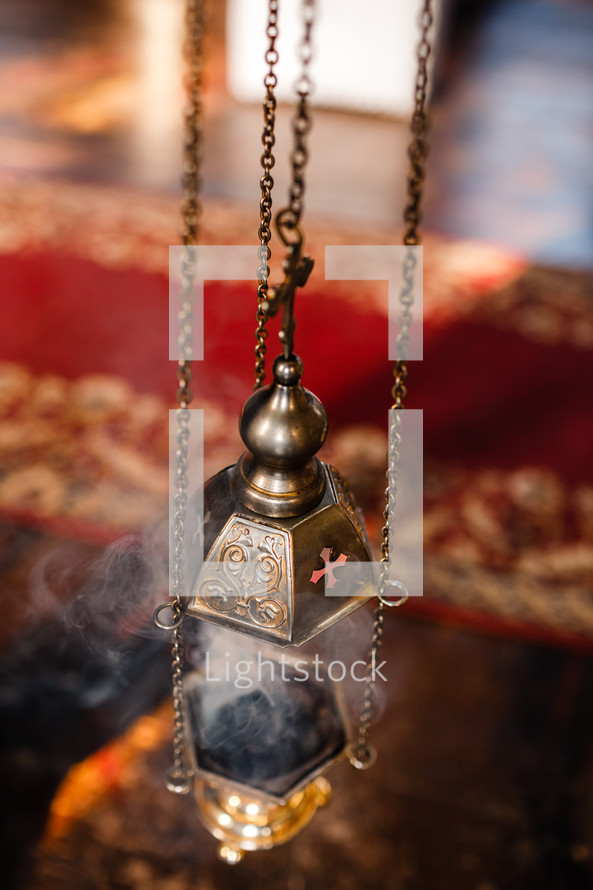 Incense holder used in religious ceremonies in church.