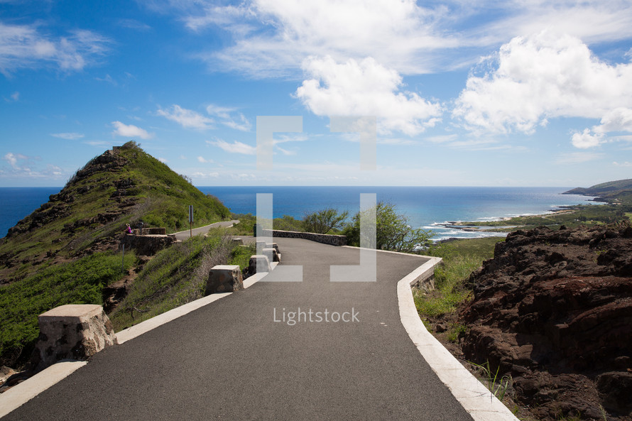 scenic road along a shoreline in Hawaii 