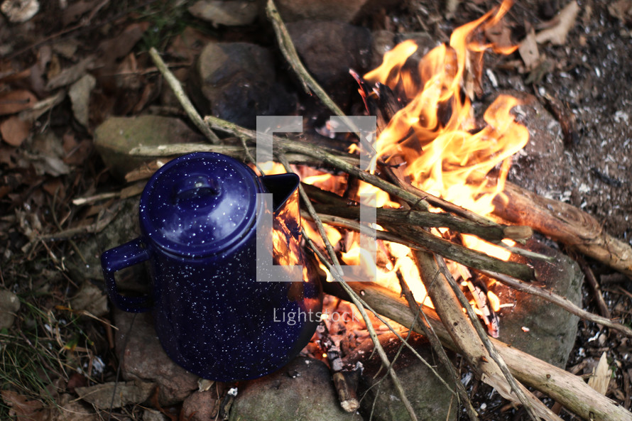 brewing coffee over a campfire 