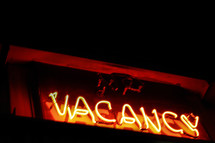Illuminated "vacancy" sign.