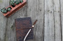stick pencil on a leather bound Bible 