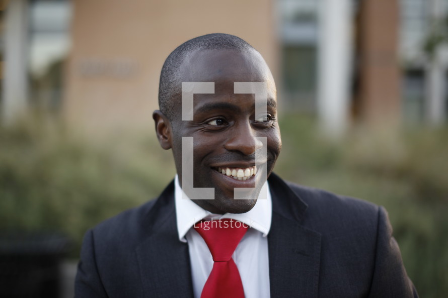 smiling African-American man in a suit 