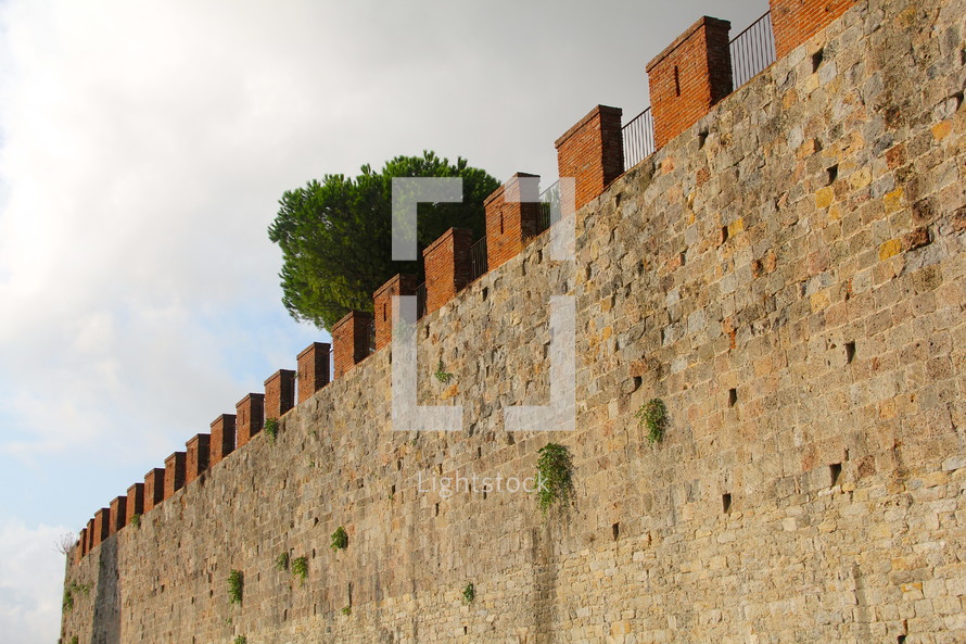 A fortress wall around an ancient city 