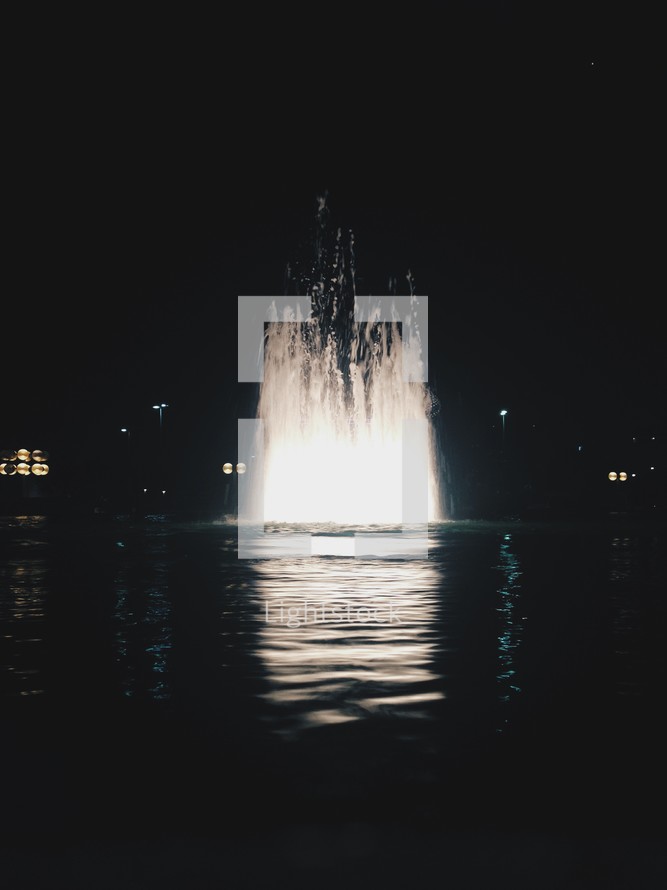 glowing fountain at night