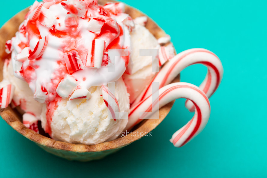 bowl of ice cream with candy canes 