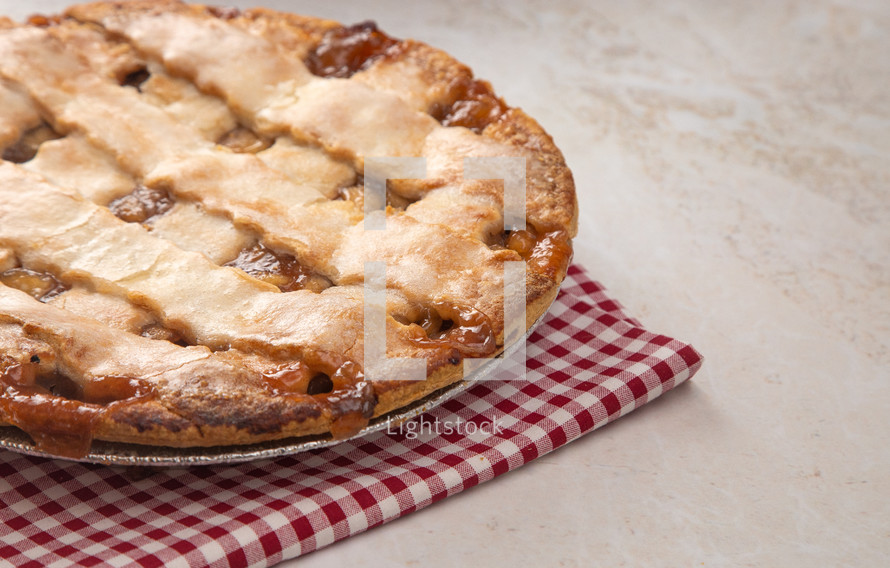 lattice Topped Apple and Caramel Pie