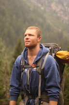 a man backpacking 