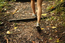 a woman hiking up a trail in Hawaii 