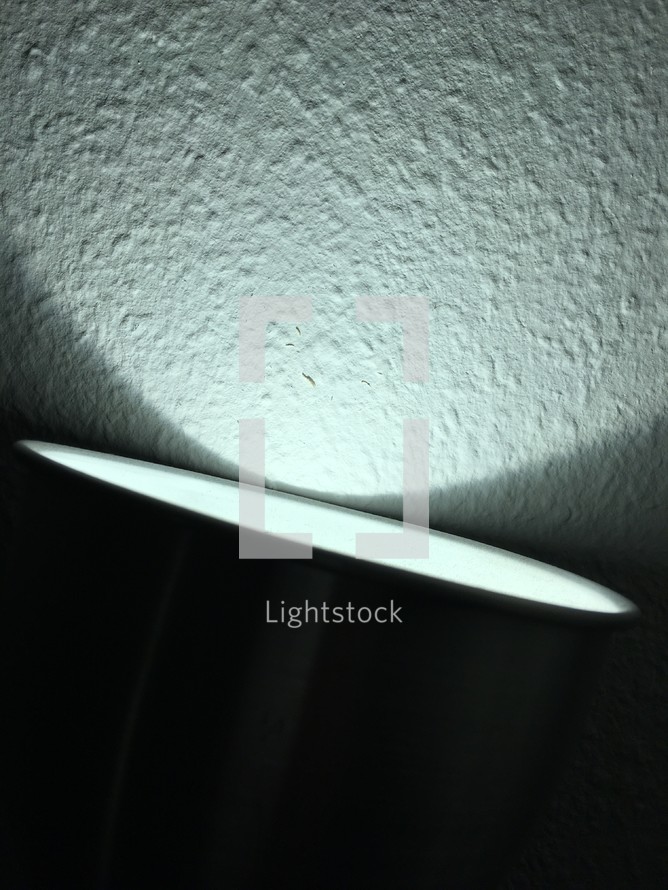light on a wall from a lamp 