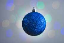 hanging ornament and bokeh Christmas lights 