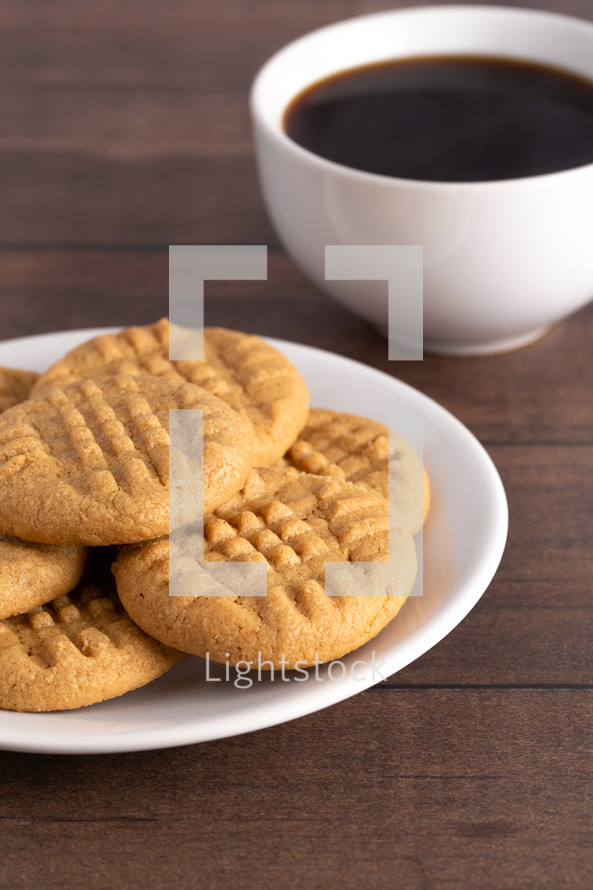 Classic Homemade Peanut Butter Cookies on a White Saucer