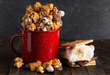 Smore Flavored Popcorn in a Red Camping Mug
