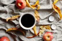 apples, fall leaves, and coffee cup 
