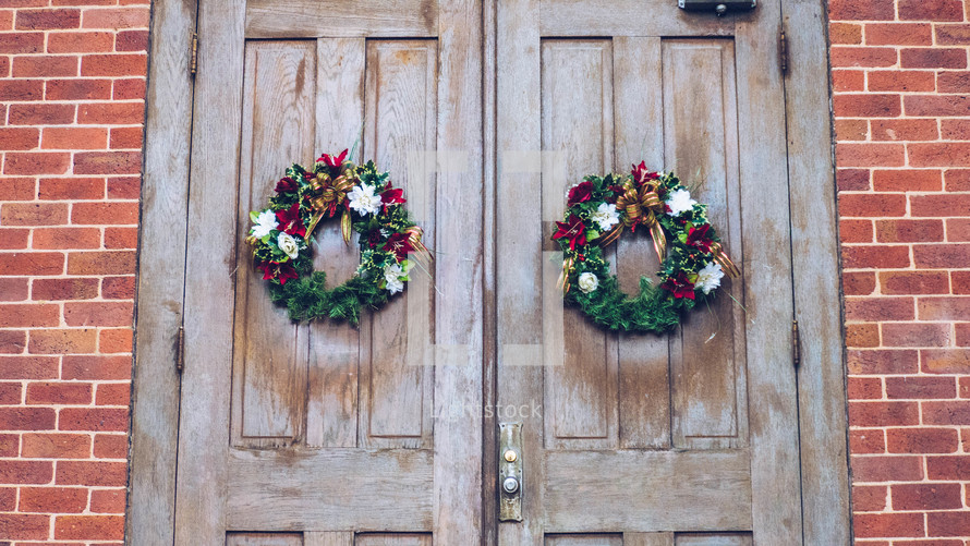 Christmas wreaths on wood doors 