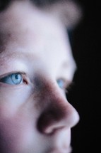 a boy child's blue eyes 