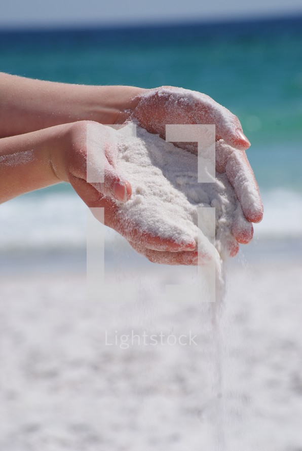 sand in the palms of the hands 