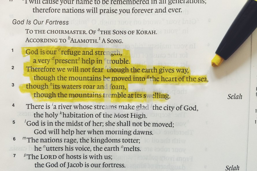 God is our refuge and strength, highlighted pages of a Bible 