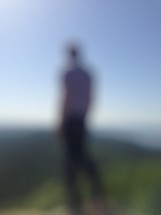 blurry image of a man