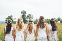 bridesmaids with flowers in their hair 