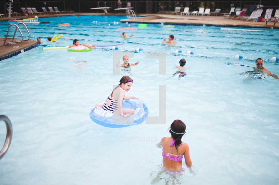 children in a public pool 