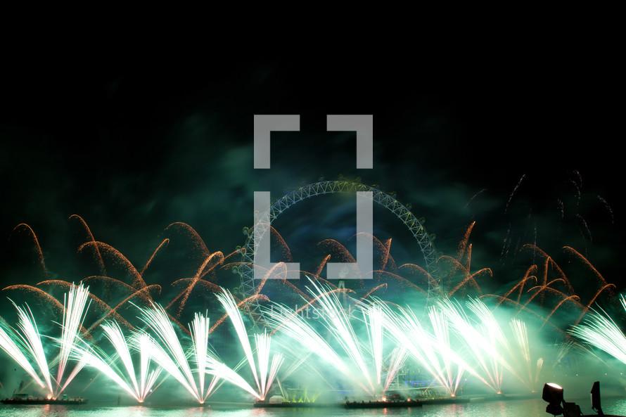 fireworks surrounding the London Eye for New Years eve celebration