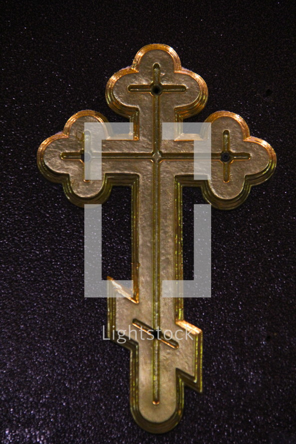 Golden orthodox cross